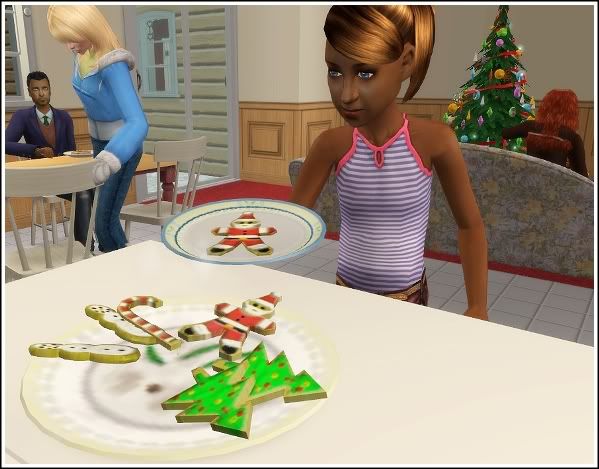 Emily takes Christmas cookie